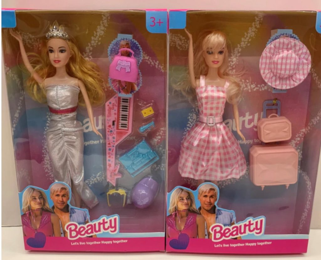 Two Counterfeit Barbie Dolls side by side.