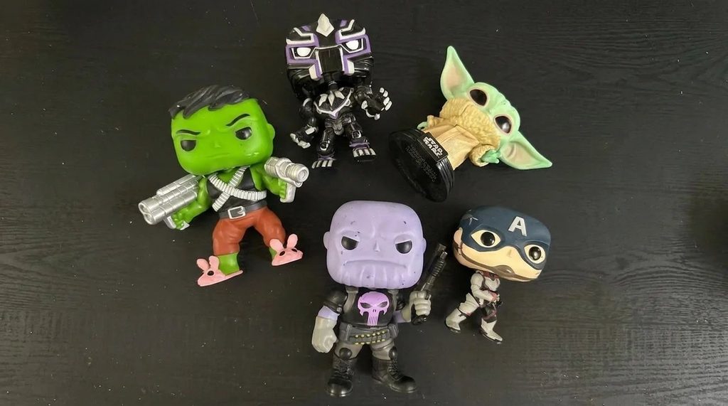 Collection of assorted Funko Pops out of their original box.