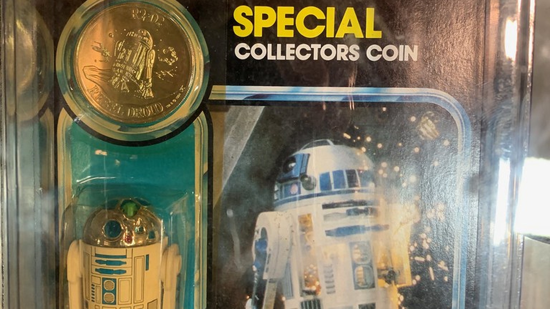 Mint-on-card Kenner Power of the Force R2-D2 with collector coin and $1200 tag
