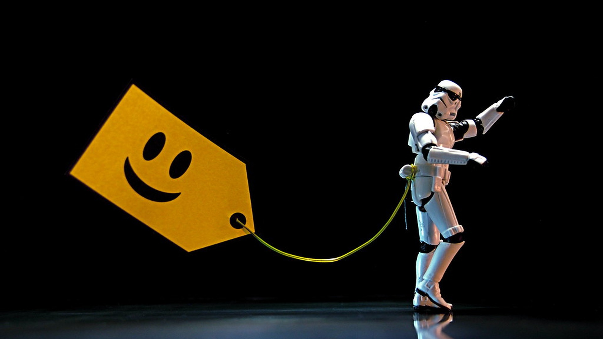 Star Wars Stormtrooper action figure tethered to a yellow price tag
