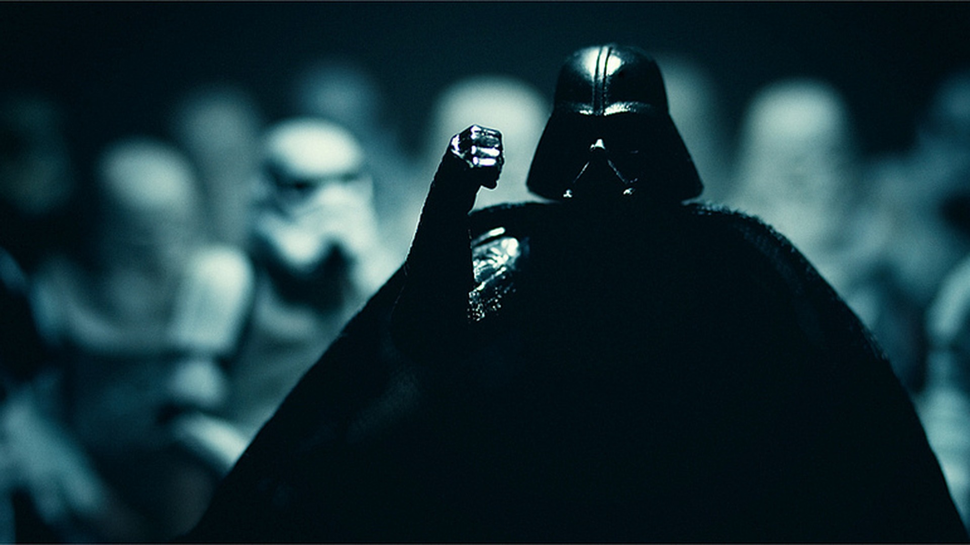 Darth Vader action figure with Stormtrooper army figures behind him
