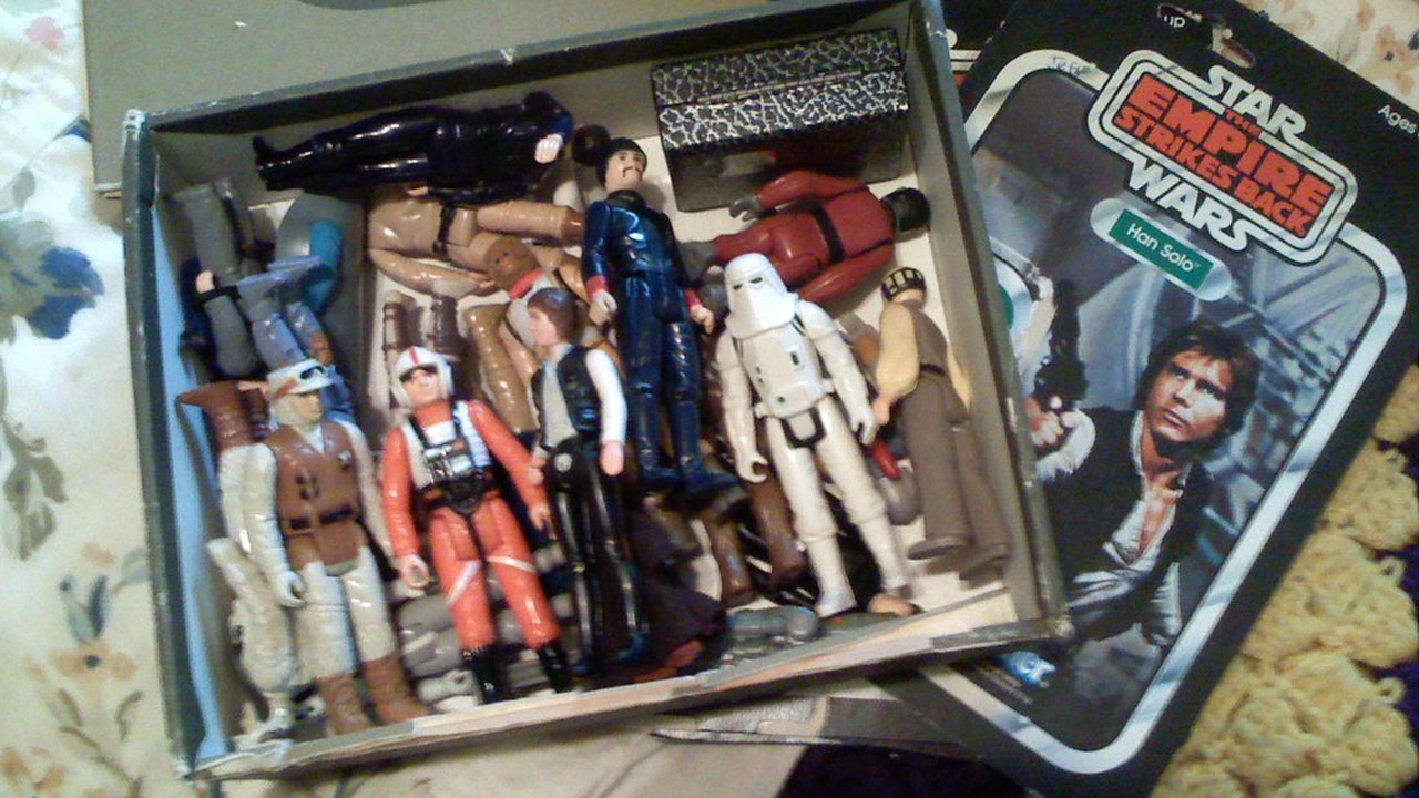 How to sell a Star Wars collection - box of vintage Kenner Star Wars figures and an Empire Strikes Back cardback